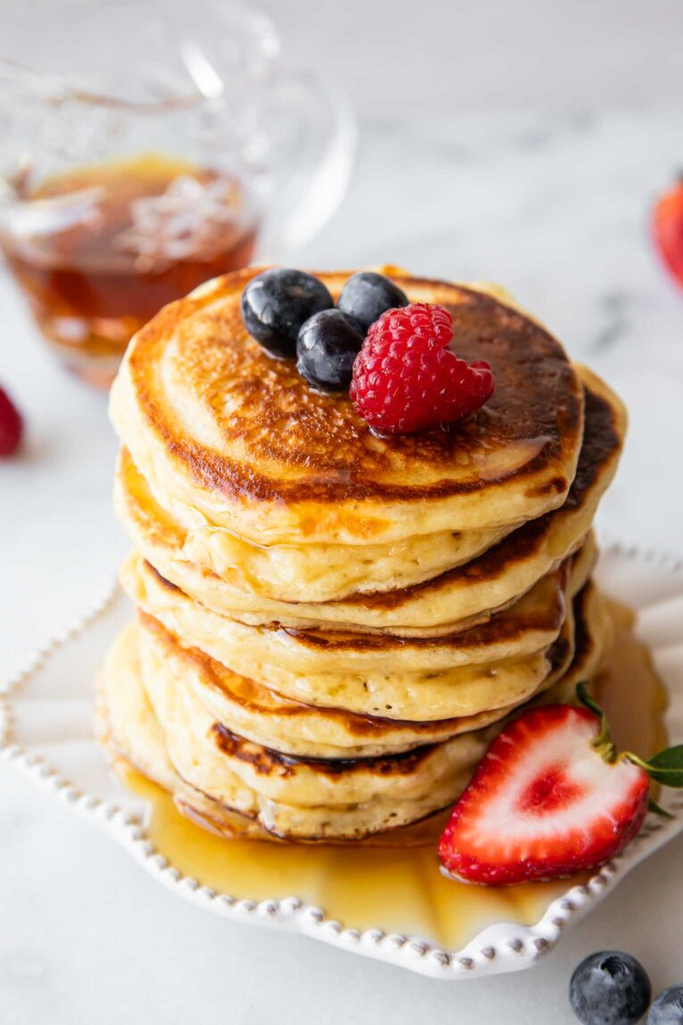 Top angled image of A stack of greek yogurt pancakes.