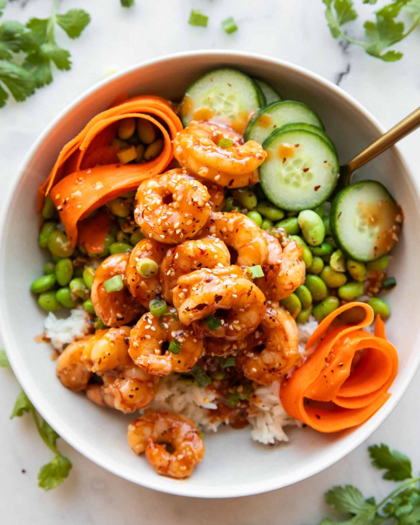 Sticky Garlic Sesame Shrimp in a bowl.