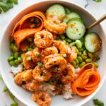Sticky Garlic Sesame Shrimp in a bowl.