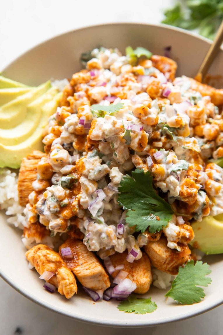 Angled image of Street corn chicken rice bowl.