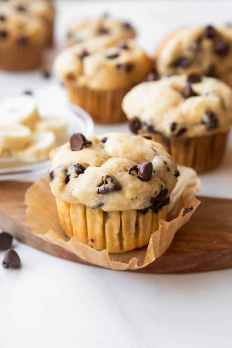 Banana chocolate chip muffin with wrapper unpeeled.