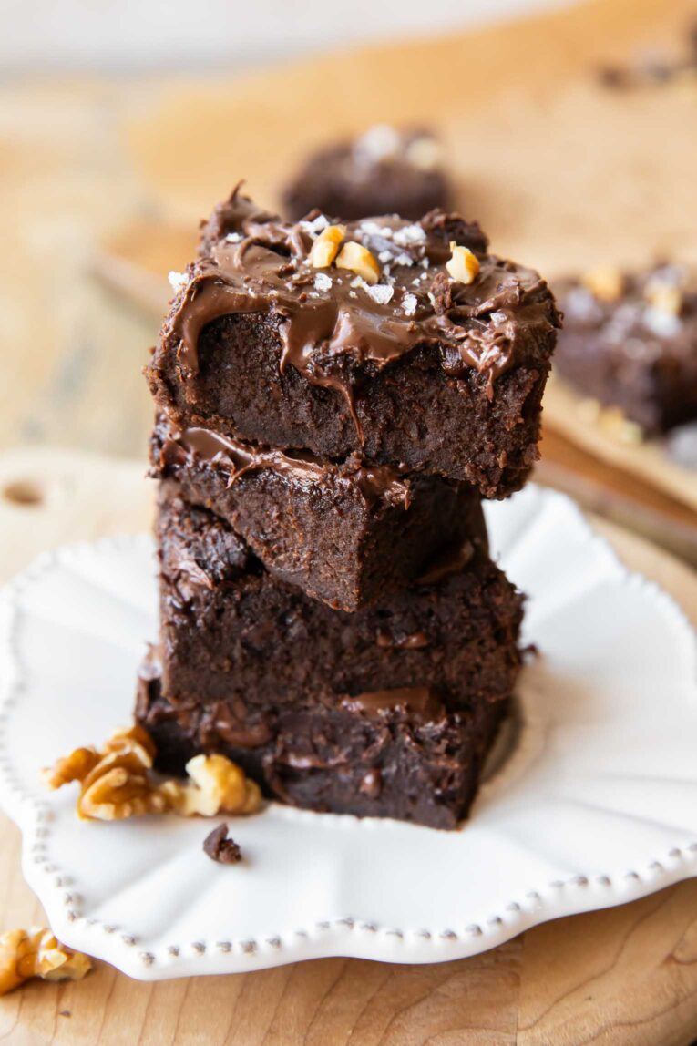 Black bean brownies stacked on top of each other.