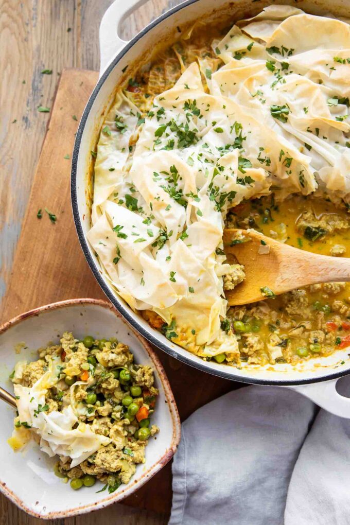 Phyllo Topped Ground Turkey Casserole in a pot and served on a plate.