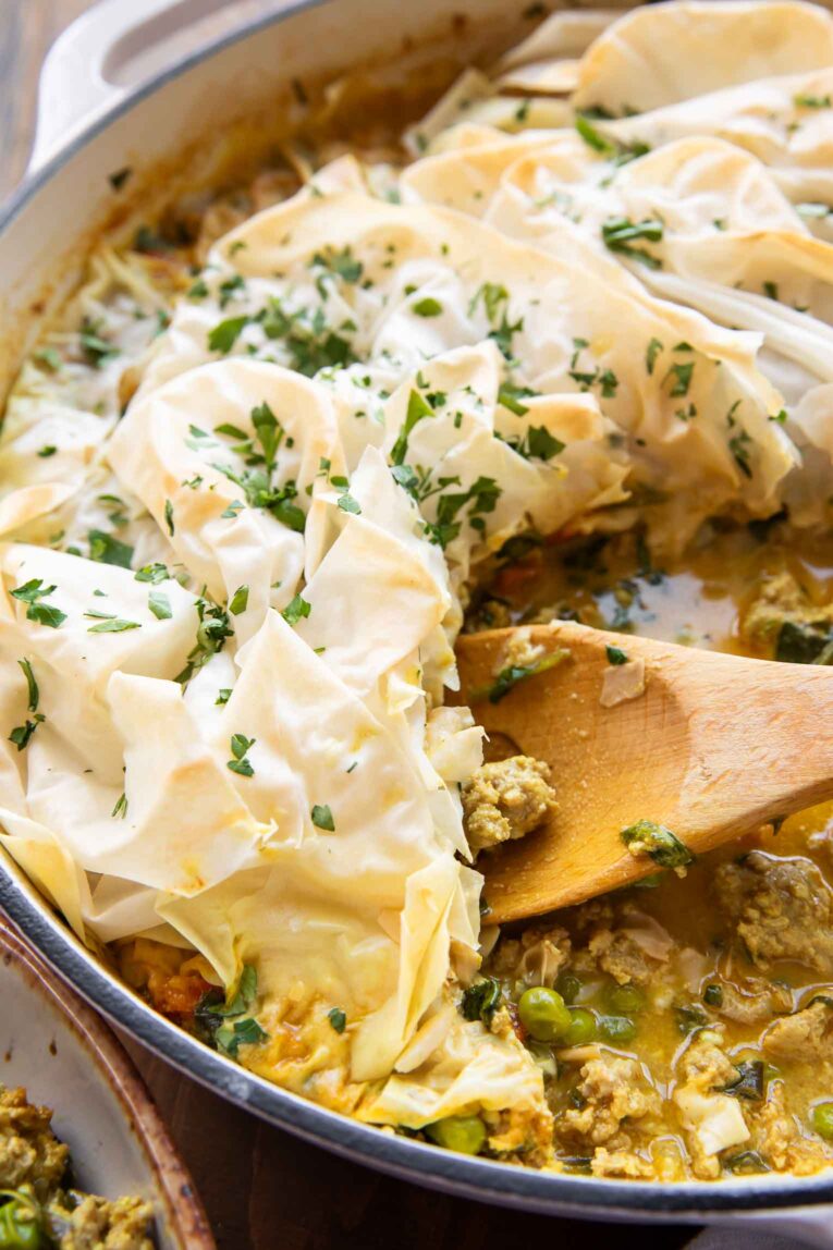 Phyllo Topped Ground Turkey Casserole with a spoon.