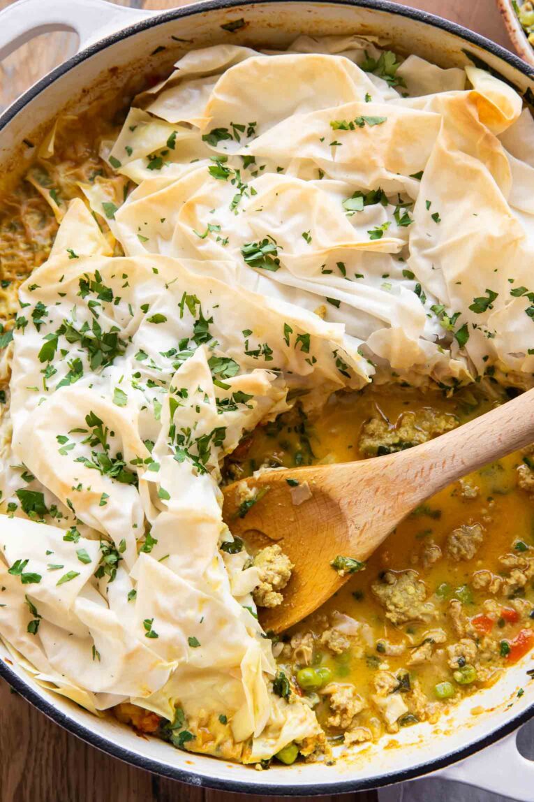 Phyllo Topped Ground Turkey Casserole with a spoon.