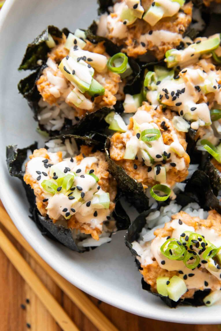 Close up of salmon sushi cups.