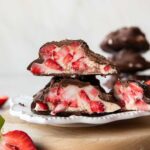 Strawberry chocolate yogurt bite cut in half.