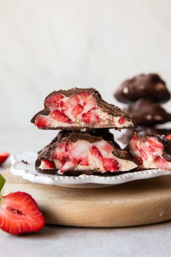 Strawberry chocolate yogurt bite cut in half.