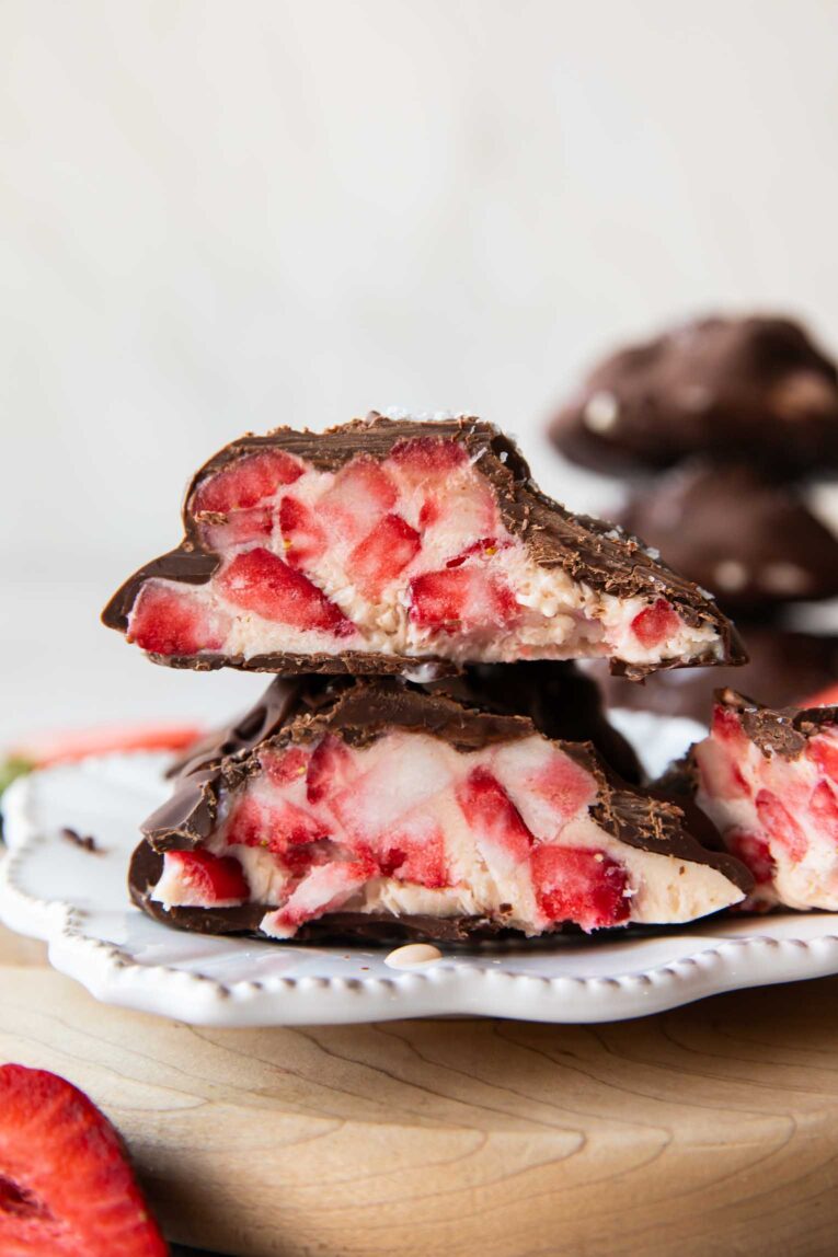 Strawberry chocolate yogurt bite cut in half.