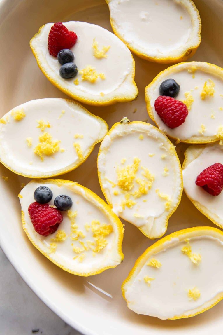 Lemon posset inside a lemon peel.