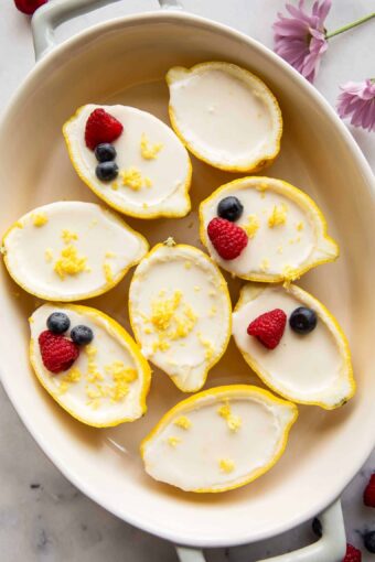 Lemon posset inside a lemon peel.