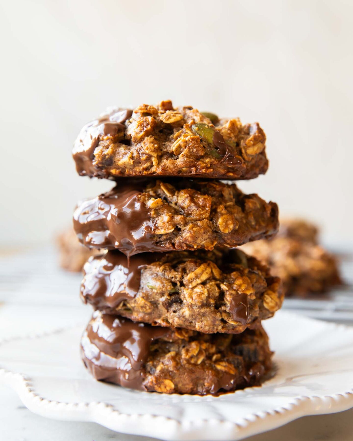 Oatmeal breakfast cookies stacked on top of each other.