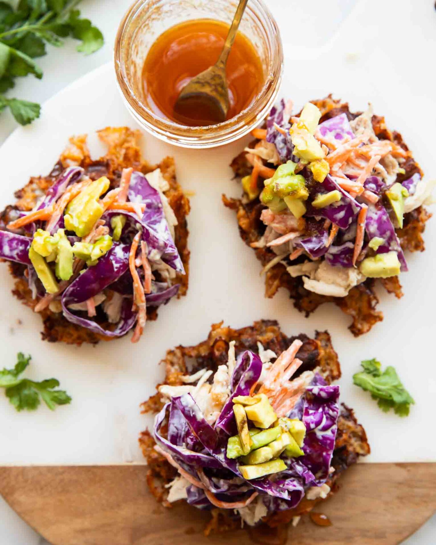 Hot honey sweet potato waffles on a cutting board.