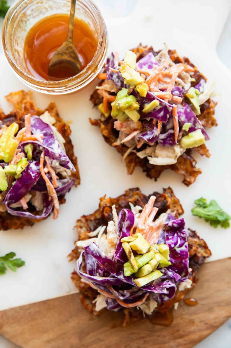 Hot honey sweet potato waffles on a cutting board.