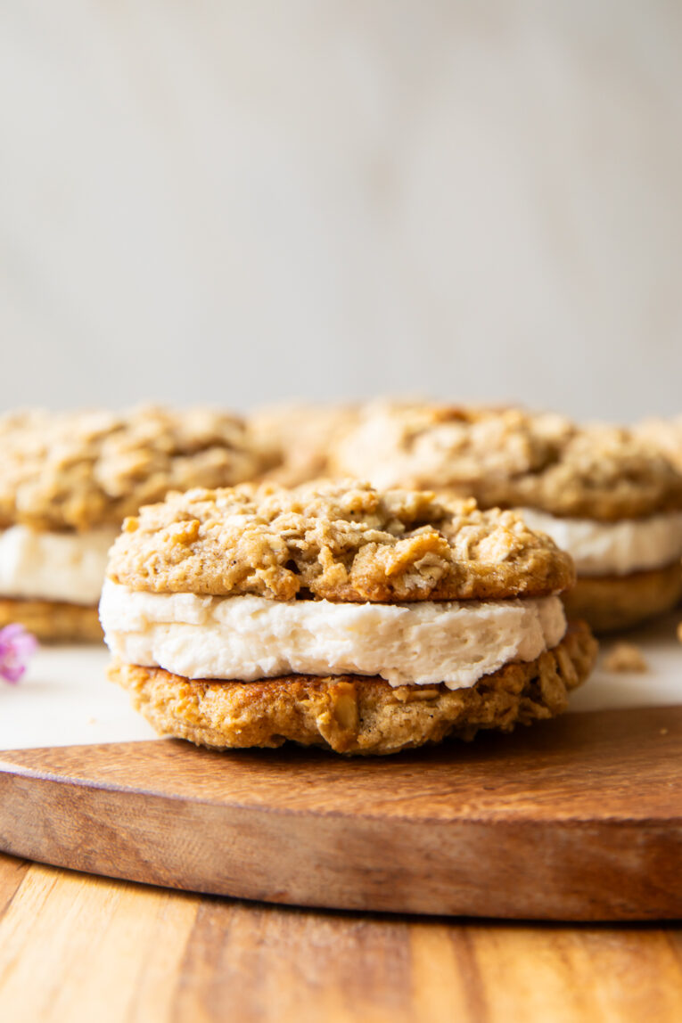 Oatmeal Cream pies on a cutting board.