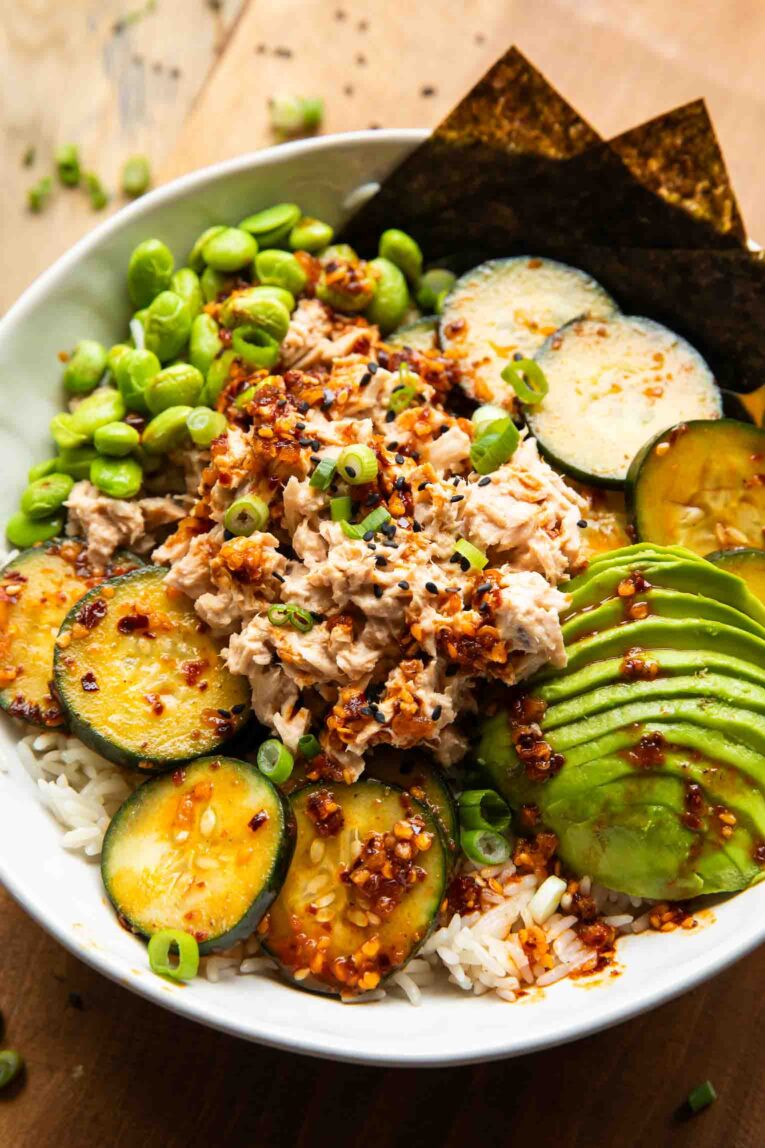 Sushi bowl on a wooden surface.