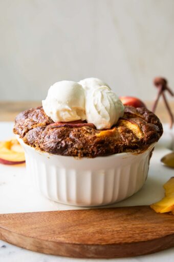 Baked Peach oats in a dish.
