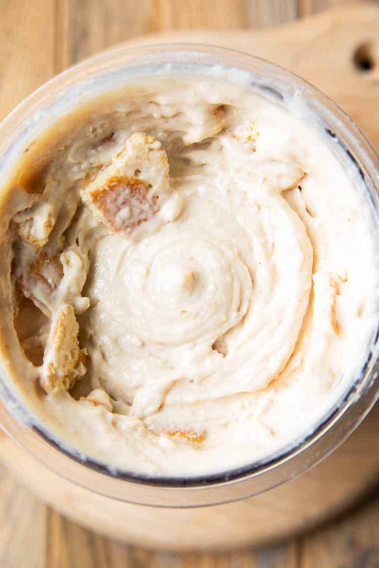 Top view of Biscoff ice cream ingredients mixed together.