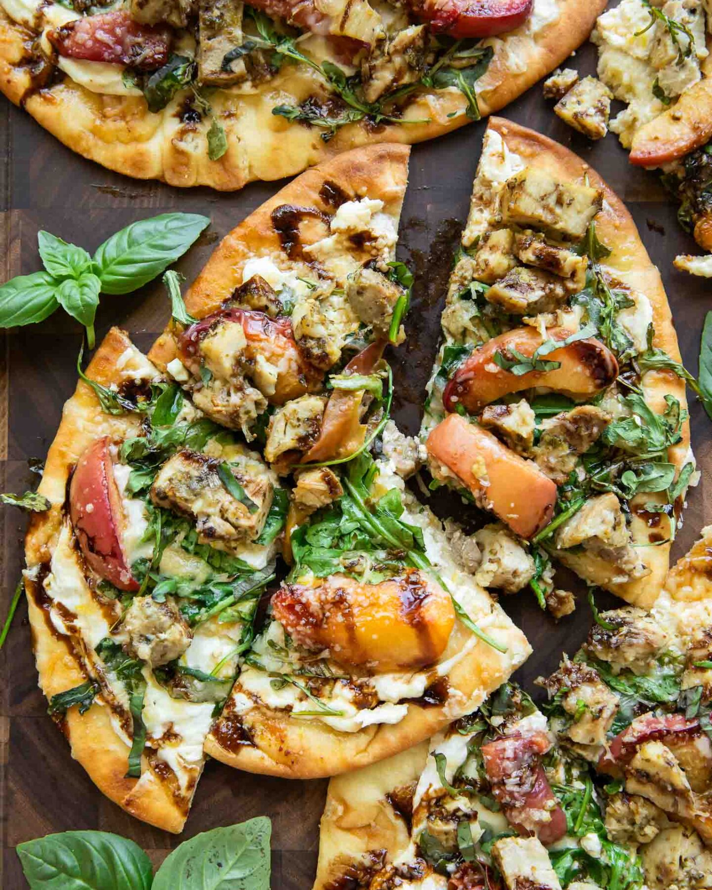 Balsamic Peach Chicken Flatbread pizza cut into triangles.