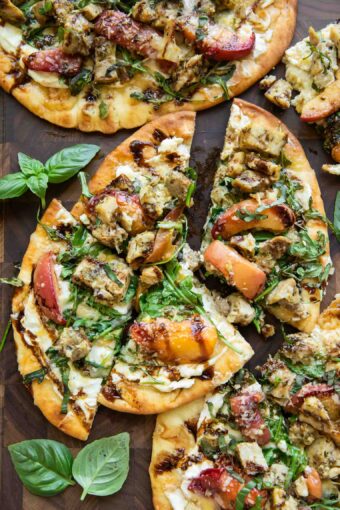 Balsamic Peach Chicken Flatbread pizza cut into triangles.