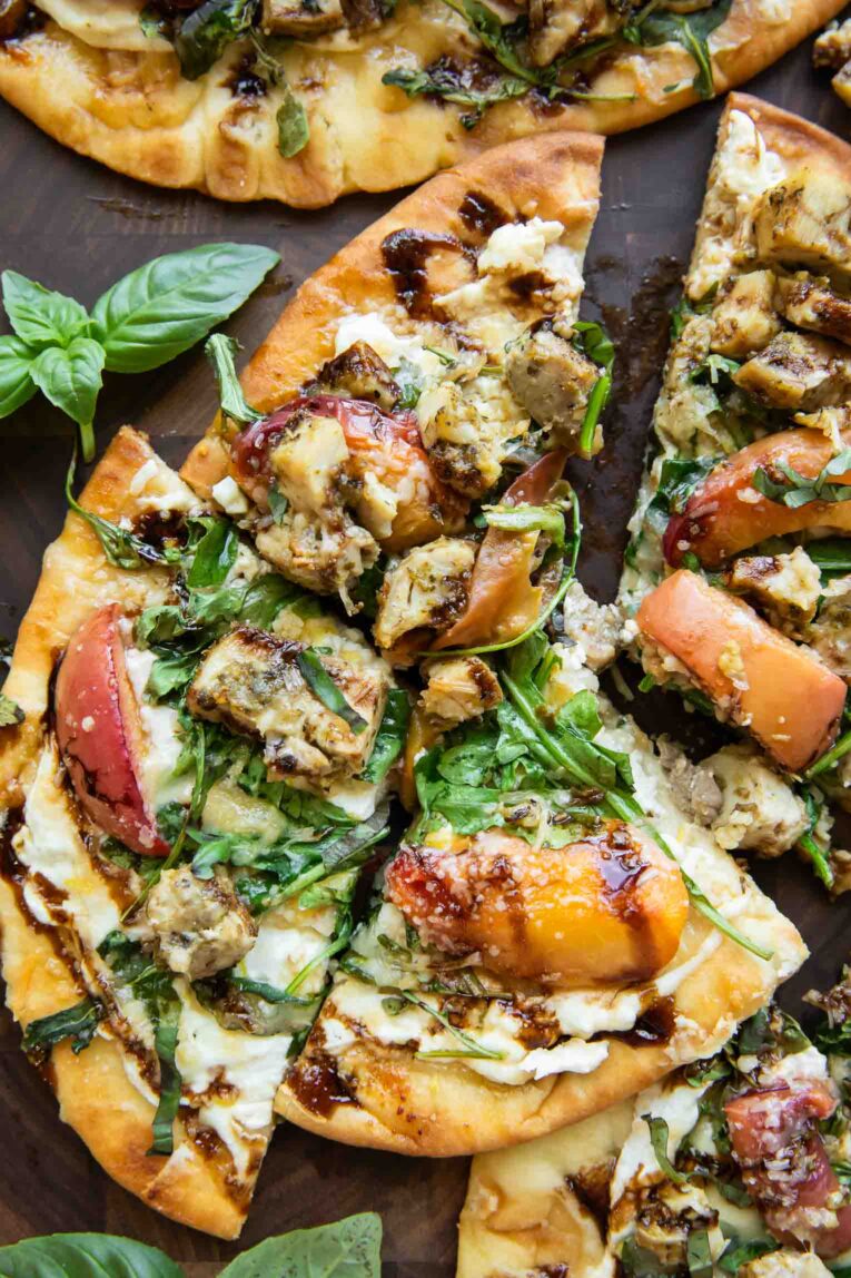 Balsamic Peach Chicken Flatbread pizza cut into triangles.