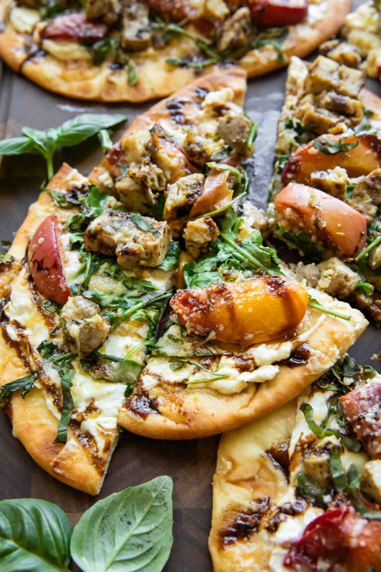 Balsamic Peach Chicken Flatbread pizza cut into triangles.