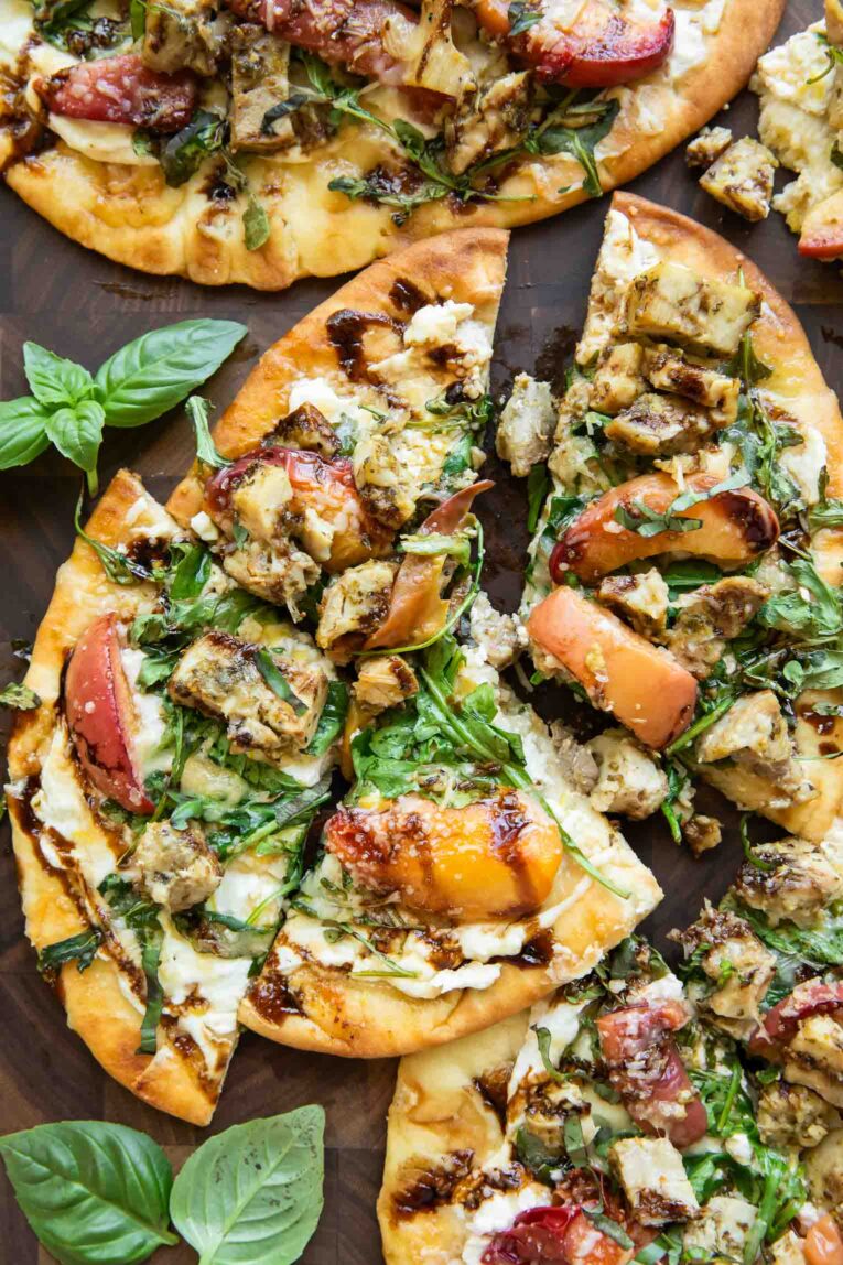 Balsamic Peach Chicken Flatbread pizza cut into triangles.