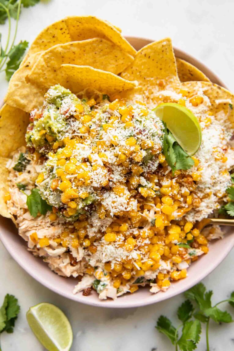 Guacamole crispy sweetcorn chicken salad in a bowl.