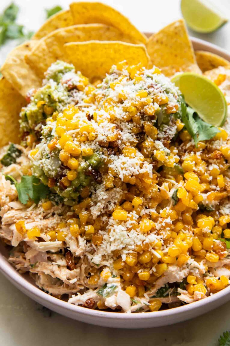 Guacamole crispy sweetcorn chicken salad in a bowl.