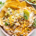 Guacamole crispy sweetcorn chicken salad in a bowl.