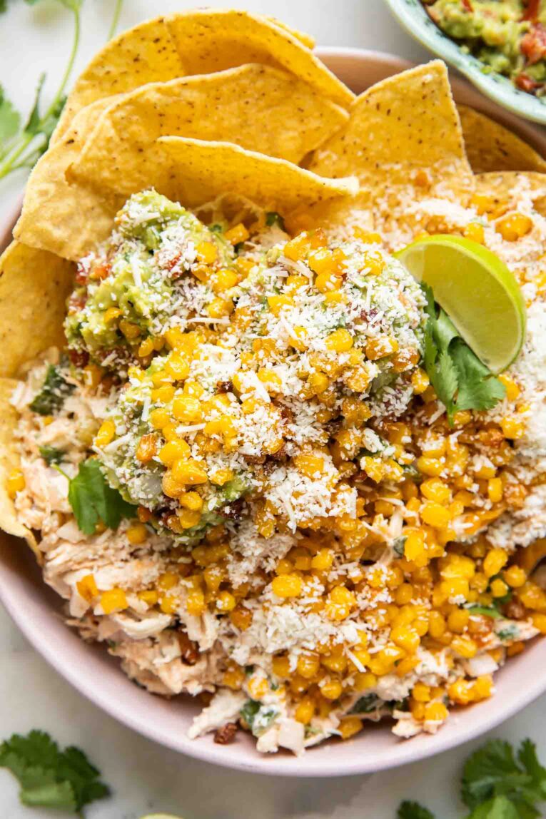 Guacamole crispy sweetcorn chicken salad in a bowl.