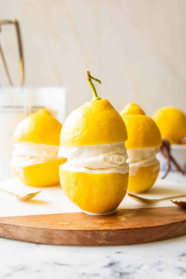Limoncello Ice Cream in between two lemons.