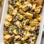 Spinach & Mushroom Tortellini Bake in a baking dish.
